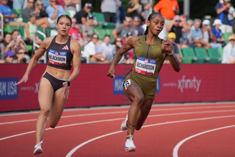 Jun 27, 2024; Eugene, OR, USA; Sha'Carri Richardson defeats Kennedy Blackmon to win women's 200m heat in 21.99 for the top time during the US Olympic Team Trials at Hayward Field. Mandatory Credit: Kirby Lee-USA TODAY Sports