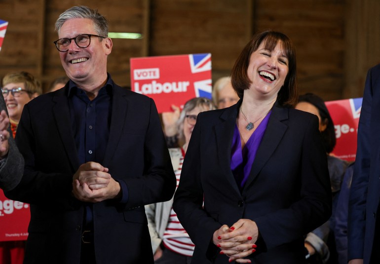 Keir Starmer and Rachel Reeves together on the campaign trail. They are smiling.