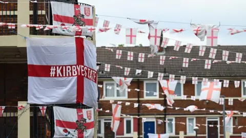 Getty Images Kirby estate in London decorated with England flags