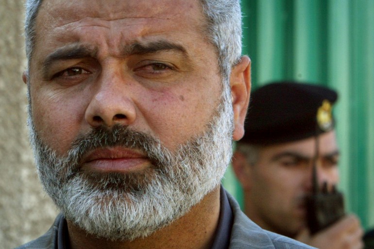 Palestinian Hamas leader Ismail Haniyeh speaks to the media