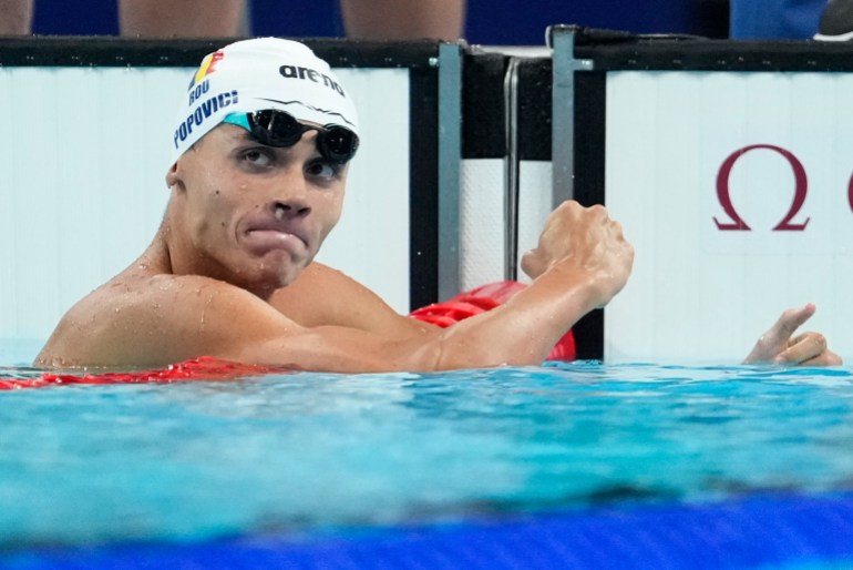 Romania's David Popovici beat Britain's Matt Richards by 0.02 of a second to win the men's 200 metres freestyle gold.