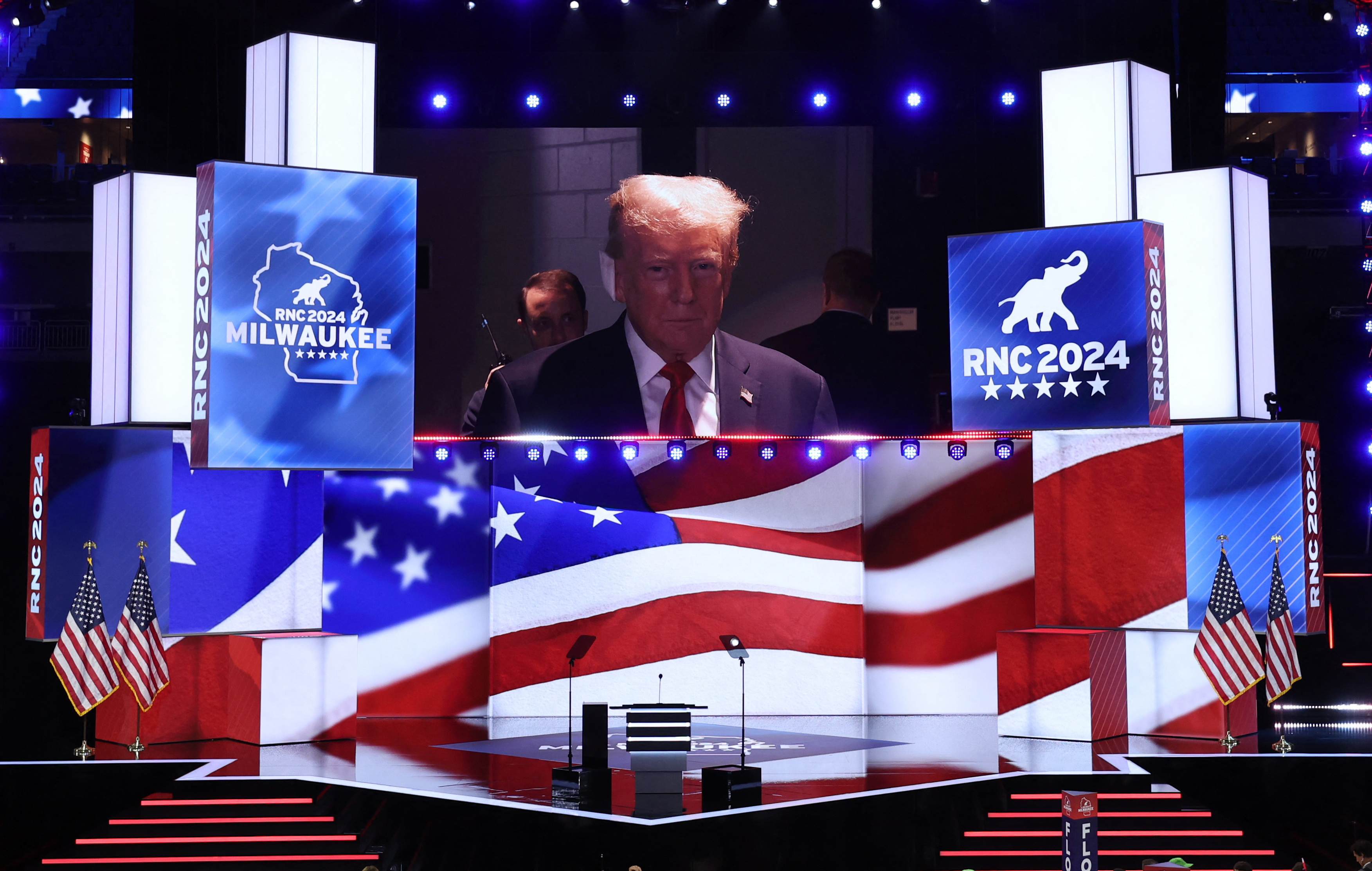 Former President and current Republican presidential nominee Donald Trump is shown on a large screen during Day one of the Republican National Convention