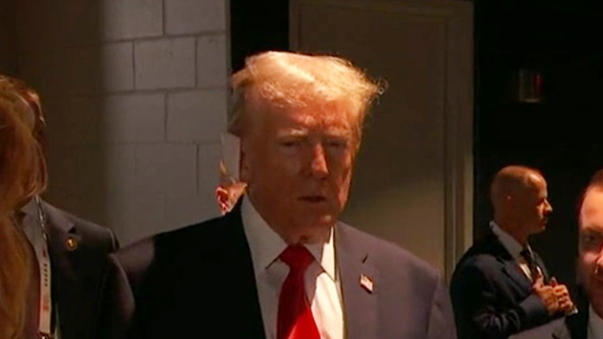 Trump was seen with his right ear bandaged after being grazed by a bullet in an assassination attempt on Saturday