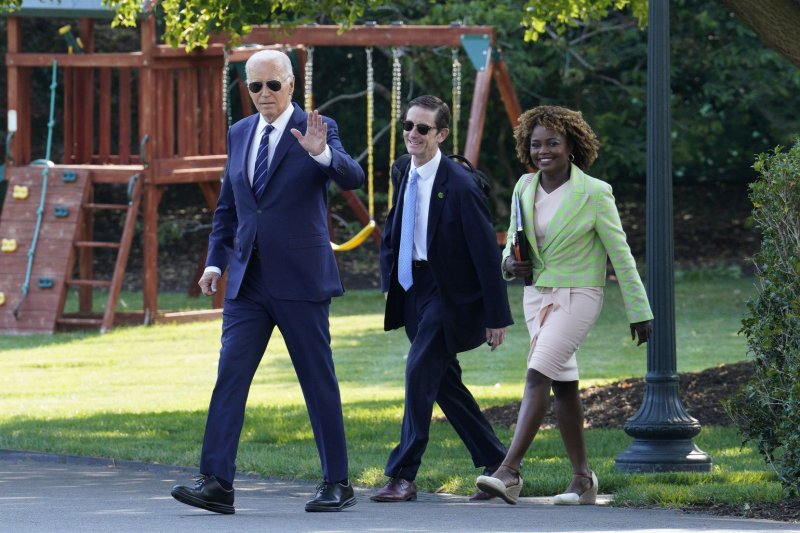 President Joe Biden and staff members walk to board Marine One helicopter on the South Lawn of the White House in Washington, D.C., as he departs for Las Vegas on July 15. Since Wednesday, he has been self-isolating at his Delaware vacation home after being diagnosed with COVID-19, but is scheduled to return to the White house on Tuesday. Photo by Yuri Gripas/UPI