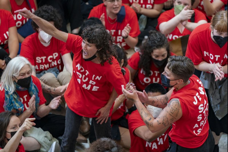 Members of Jewish Voice for Peace hold a pro-Palestinian demonstration one day before Israeli Prime Minister Benjamin Netanyahu addresses a joint session of Congress in the Cannon House Office Building at the U.S. Capitol in Washington, DC on Tuesday. Photo by Bonnie Cash/UPI