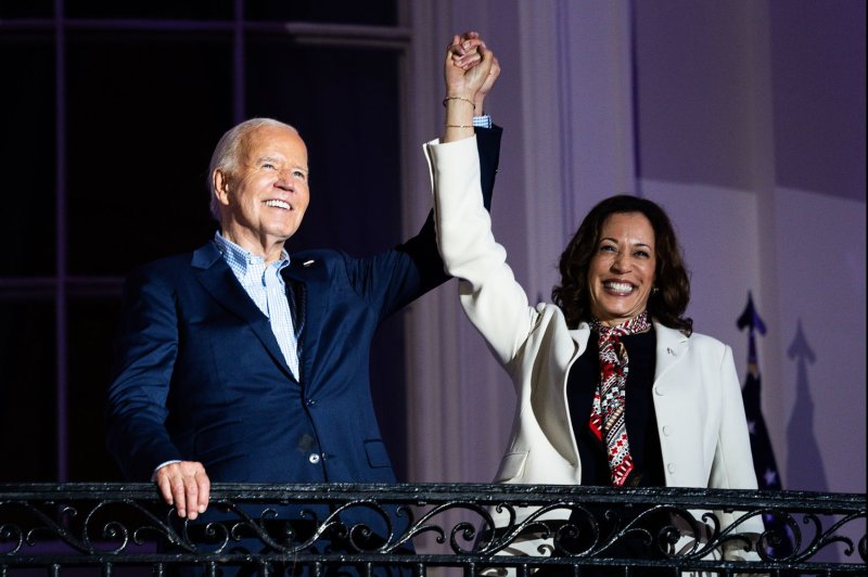 President Joe Biden and Vice President Kamala Harris appear on the Truman Balcony of the White House in Washington, D.C., to view the Independence Day fireworks display over the National Mall on July 4. Photo by Tierney L. Cross/UPI