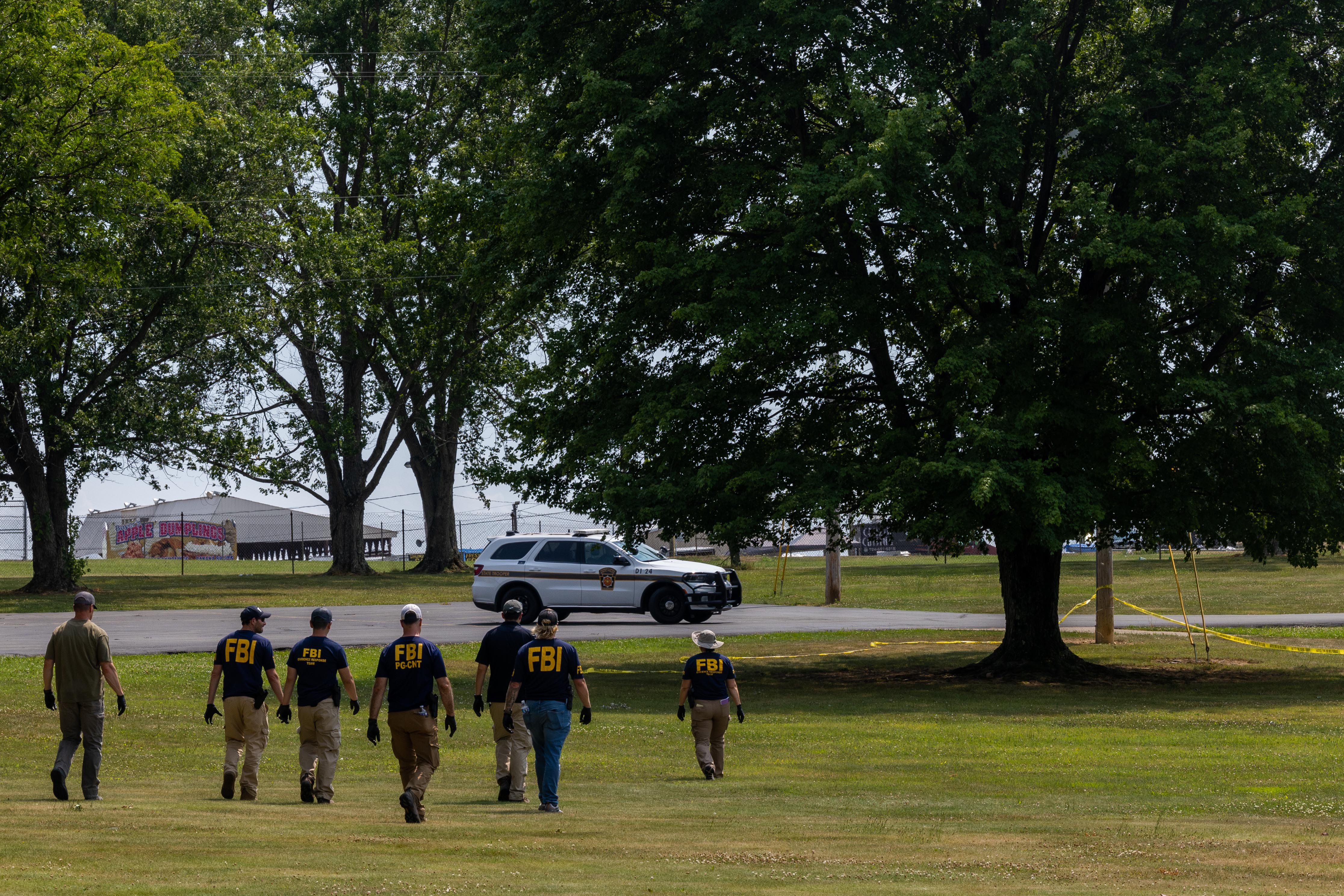 Video obtained by the U.S. Sun shows FBI agents sweeping the grounds looking for evidence