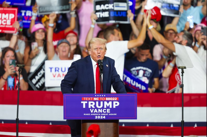 Donald Trump has repeatedly referenced his assassination attempt at rallies, telling supporters (this week, pictured) that he "took a bullet for democracy." Photo by David Jensen/EPA-EFE