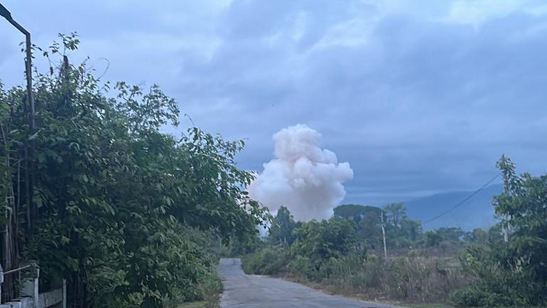 Clouds of white smoke rising after a Myanmar military bombing raid in Karen state