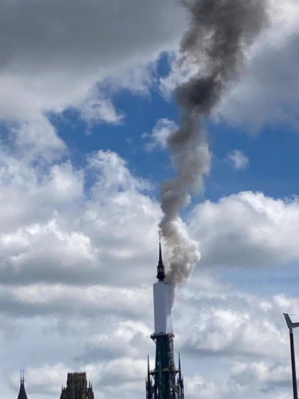 A ire broke out Thursday on a tarp covering the spire of France's Rouen cathedral. Rouen Mayor Nicolas Mayer-Rossignol said the origin of the fire is unknown. Another Rouen official said the fire was under control and no one was hurt. Photo courtesy of Nicolas Mayer-Rossignol/X