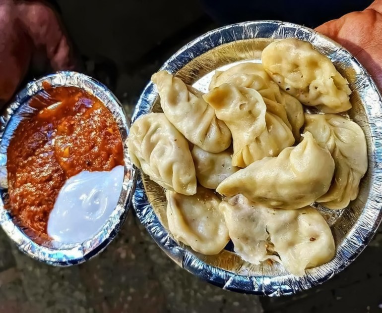 Momos with red chilli chutney