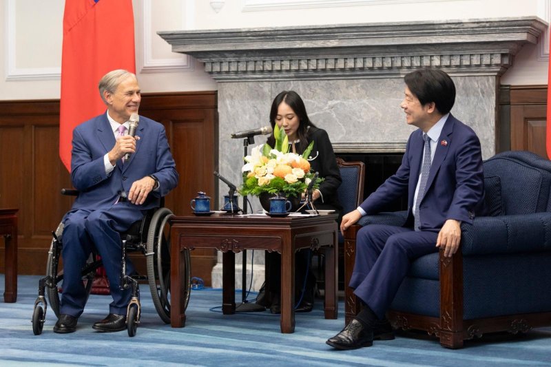 Texas Gov. Greg Abbott (L) speaks Sunday during a visit to Taiwan while the region's president, Lai Ching-te, looks on. Photo courtesy of Texas Gov. Greg Abbott/X