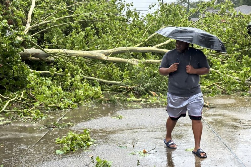 Texas utility CenterPoint Energy said trees fallen on service lines could cause customers to still be without power even if the utility's map shows power was restored in their area. File Photo by Carlos Ramirez/EPA-EFE