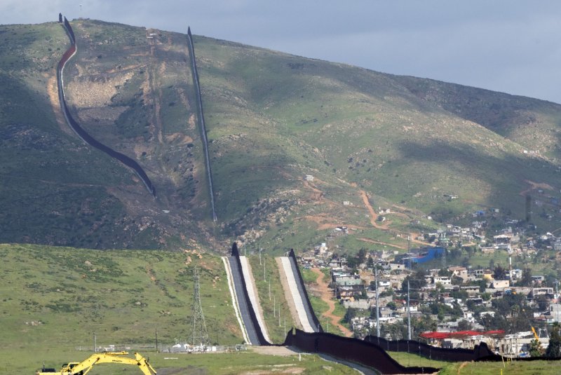 A secondary border wall separating the United States and Mexico continues to be constructed at the border near Otay Mesa, California, on Tuesday, March 12, 2024. Authorities cracked a human smuggling operation that trafficked migrants into Mexico then the United States Thursday Photo by Pat Benic/UPI