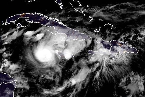 Hurricane Beryl is shown pulling away form the Caribbean Island nation of Jamaica on Wednesday Night. Image courtesy NOAA