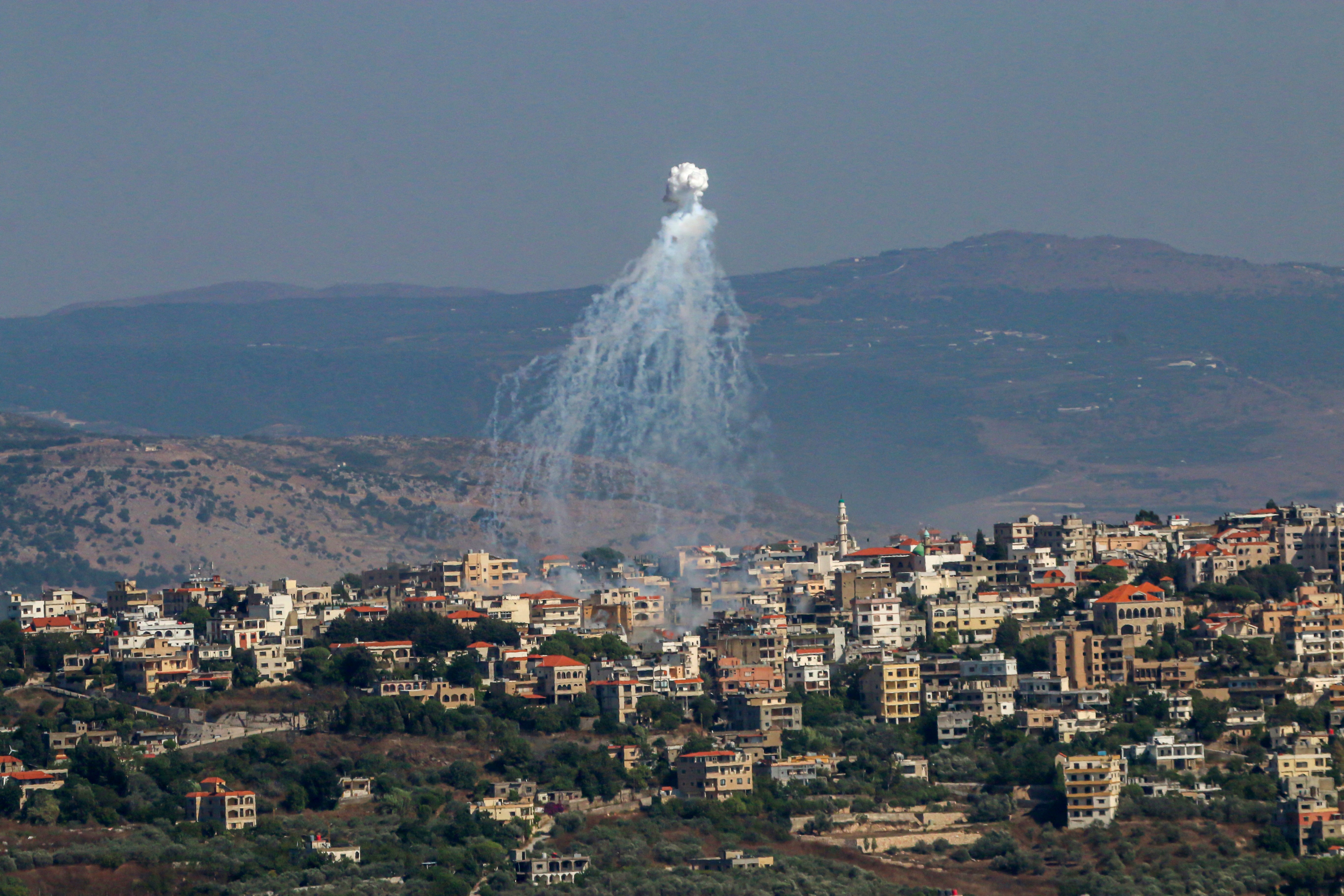 Smoke was seen billowing above the city