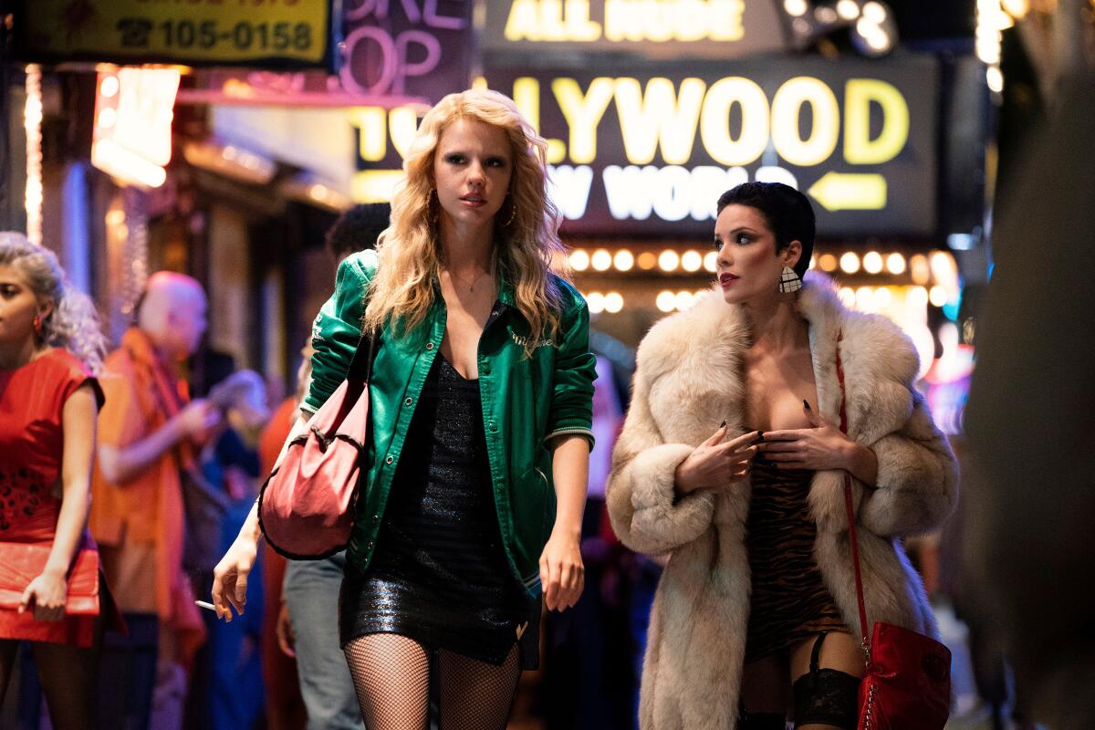 Mia Goth, left, and Halsey in the movie "MaXXXine."