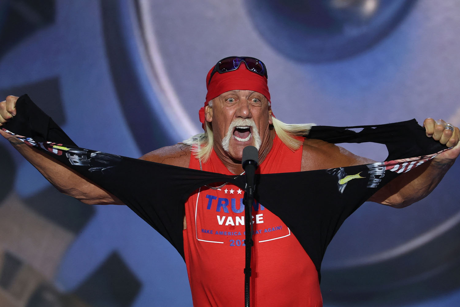 Hulk Hogan ripped his shirt in half on stage while addressing the attendees and Trump at the Republican National Convention