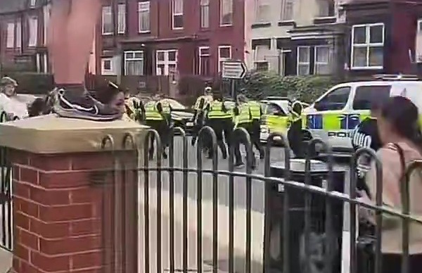 Cops fleeing rioters in Leeds