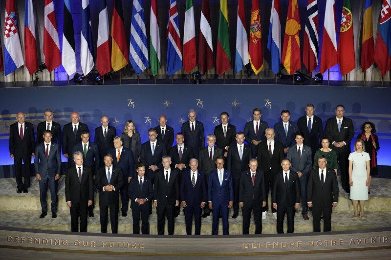 US President Joe Biden and other NATO leaders and partners participate in a group photo on the 75th Anniversary of NATO at the Andrew W. Mellon Auditorium in Washington, D.C., on Tuesday. On Wednesday, this issued a final communique that warned China against enabling Russia's war in Ukraine. Photo by Yuri Gripas/UPI