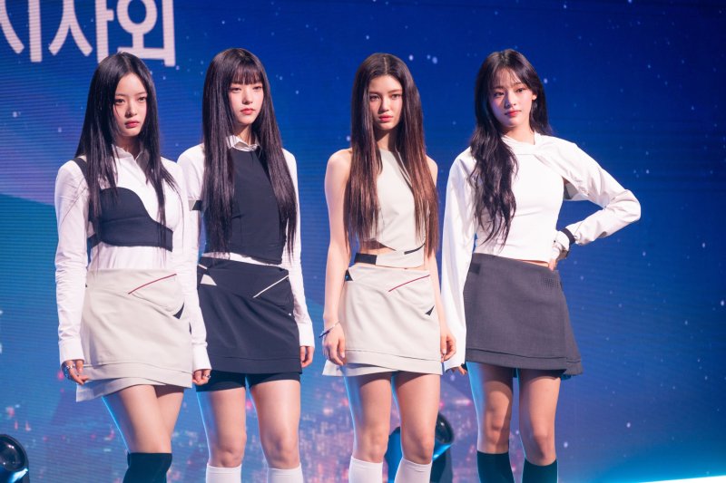 NewJeans members Hanni, Haerin, Danielle and Minji, from left to right, appear on stage at a hotel in Seoul, South Korea, on Thursday. The K-pop group was named honorary ambassador for Korean tourism for 2024. Photo by Thomas Maresca/UPI