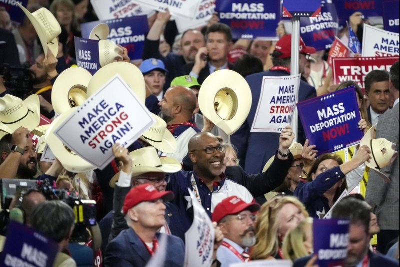 Delegates wave cowboy hats while music plays during the 2024 Republican National Convention at Fiserv Forum in Milwaukee on Wednesday. Photo by David Banks/UPI