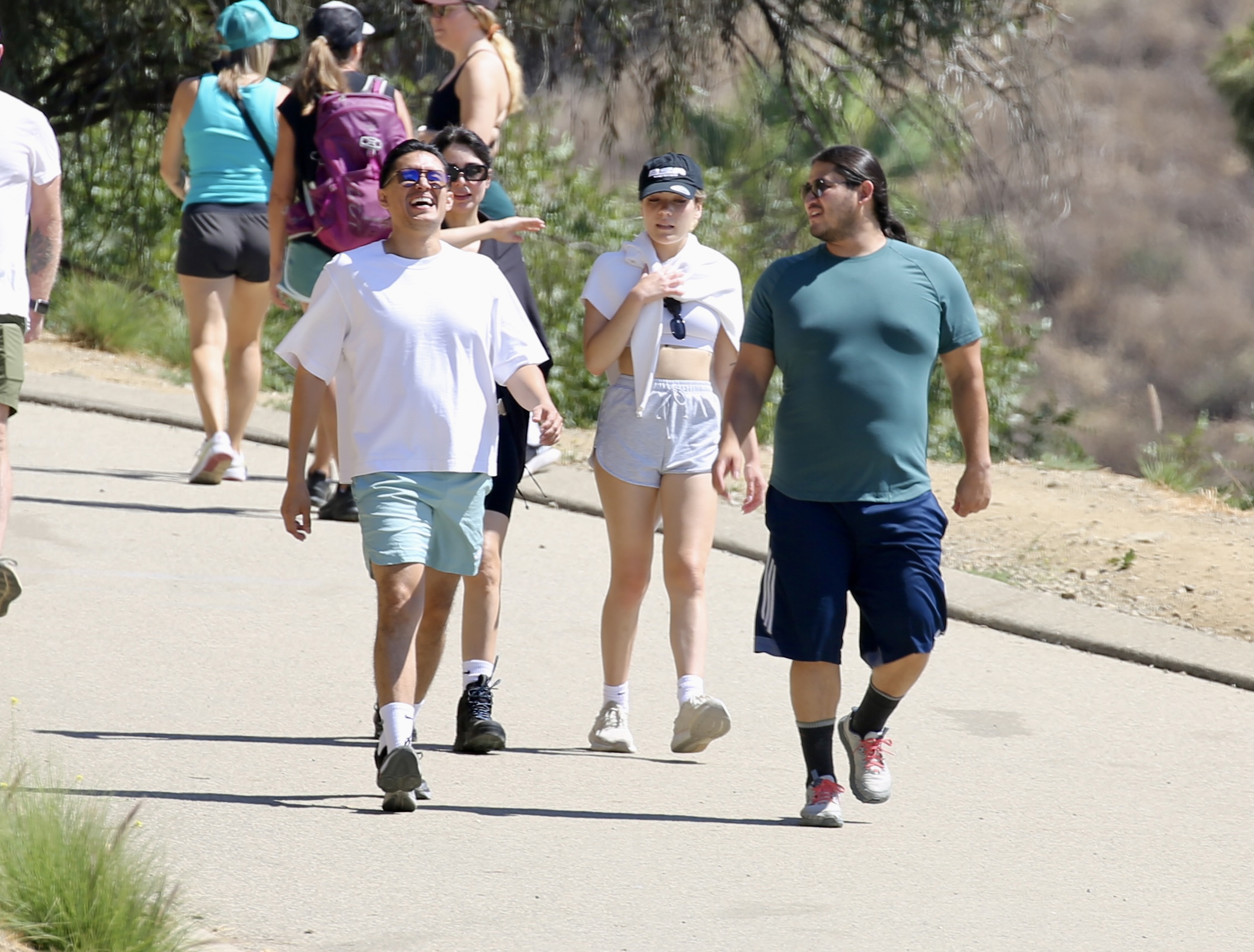 Castro and a man believed to be his brother Jesse laughed together on the hike