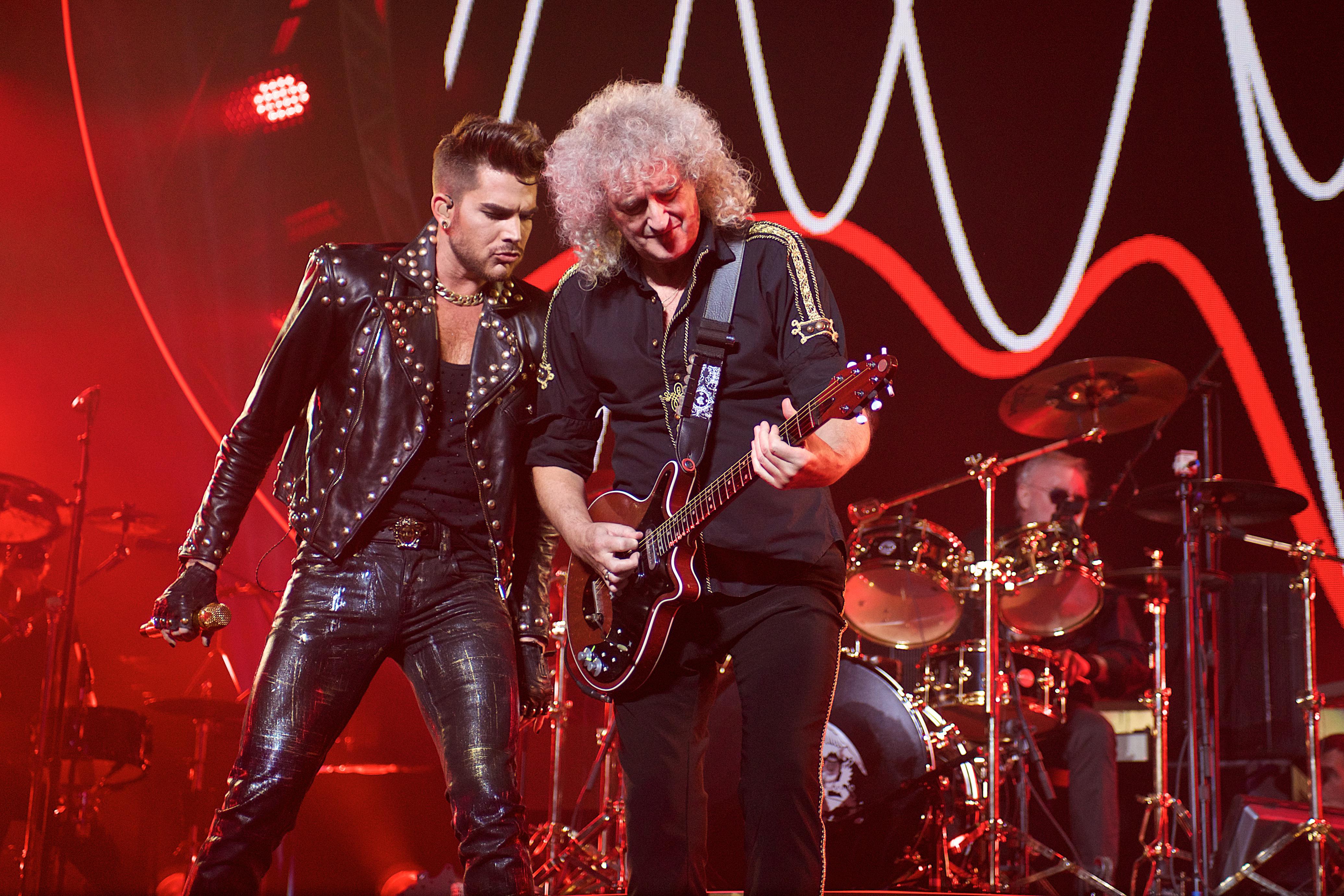 Queen's Adam Lambert and Brian May delighted Prince George at Buckingham Palace concert