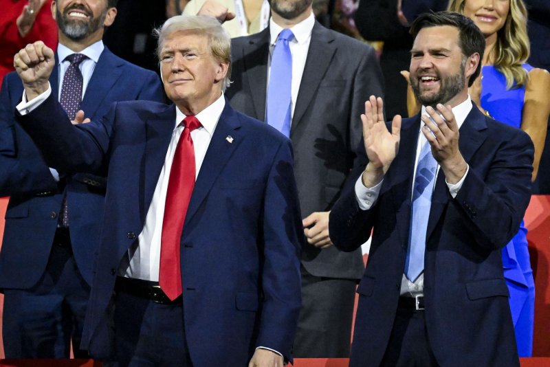 Former President and Republican presidential nominee Donald Trump and his vice presidential running mate JD Vance appear during the first day of the 2024 Republican National Convention at Fiserv Forum in Milwaukee on Monday. Day 2 on Tuesday shifts to immigration and crime. Photo by Matt Martin/UPI