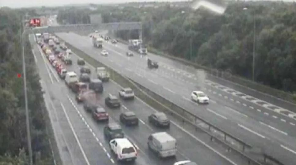 Two men have died in a motorway crash between two lorries and a car, cops said