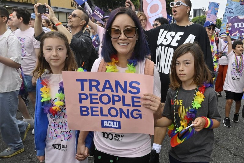 L.A. Pride parade participants walk along Hollywood Boulevard on Sunday, June 11. On Wednesday, a seven GOP-led state coalition sued to block a new rule aiming to prevent healthcare discrimination against transgender patients. Photo by Jim Ruymen/UPI