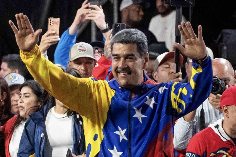 Venezuelan President Nicolas Maduro (C) celebrates after partial results were announced by the electoral council, in Caracas, Venezuela, on Monday. Photo by Ronald Pena/EPA-EFE