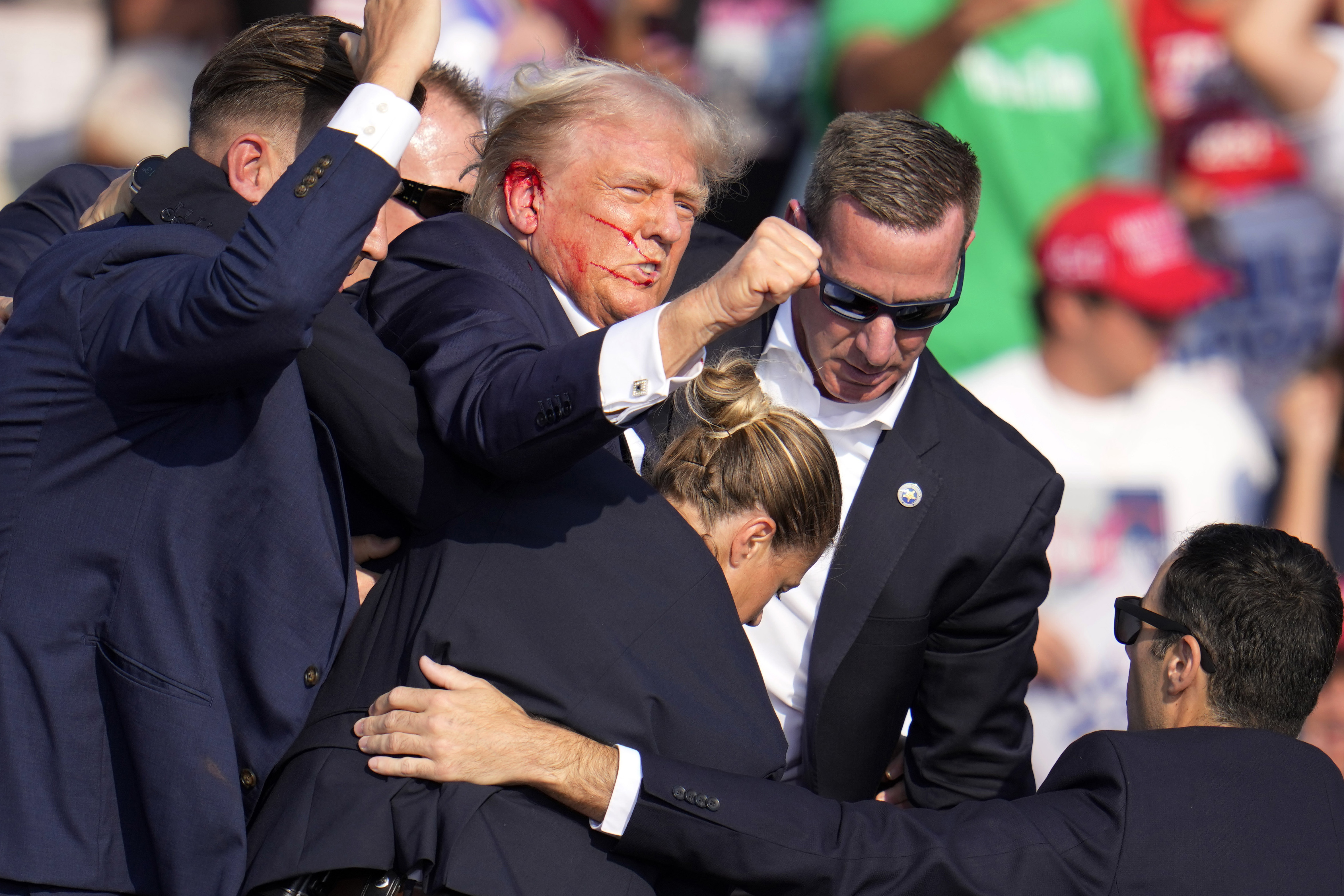 The 45th president pumped his fist after the shooting