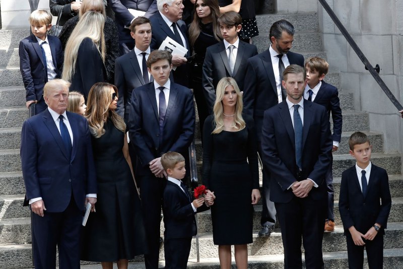 Former President Donald is pictured with Melania Trump, their son Barron, as well his his children Ivanka, Donald Jr, and Eric Trump behind the coffin with the remains of Ivana Trump at St. Vincent Ferrer Roman Catholic Church on July 20, 2022, in New York City. File Photo by Peter Foley/UPI