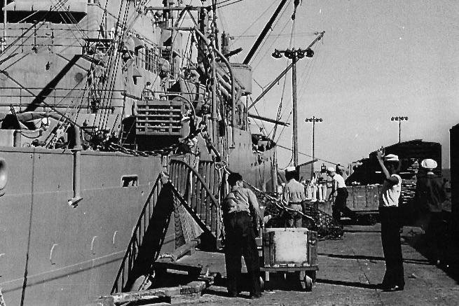 Sailors load munitions at the Port Chicago Naval Magazine in 1943-1944 at Port Chicago, Calif. On Wednesday, which was the 80th anniversary of an explosion that killed 320 people, the U.S. Navy exonerated 256 Black sailors who were "unjustly tried and convicted of mutiny." Photo courtesy of U.S. Navy/National Park Service