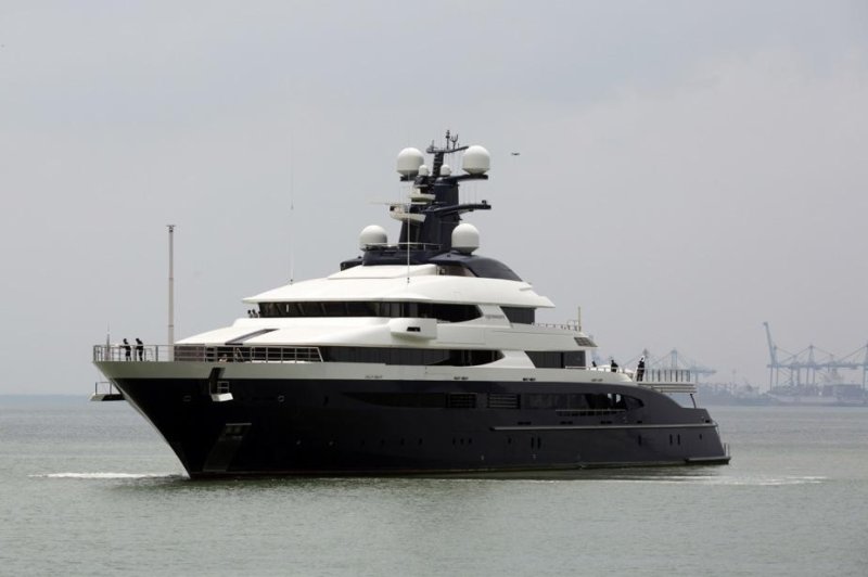 The superyacht Equanimity arrives at Port Klang, Selangor, Malaysia, on Aug. 7, 2018, and is among many assets seized from suspected 1MDB embezzler Low Taek Jho in recent years. Photo by Ahmad Yusni/EPA-EFE