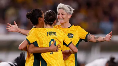 Getty Images Michelle Heyman celebrates with her teammates