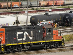 Canadian National Railway Co. says it earned $1.11 billion in the second quarter, down from $1.17 billion in the same three months of 2023. CN rail trains are shown at the CN MacMillan Yard in Vaughan, Ont., Monday, June 20, 2022.