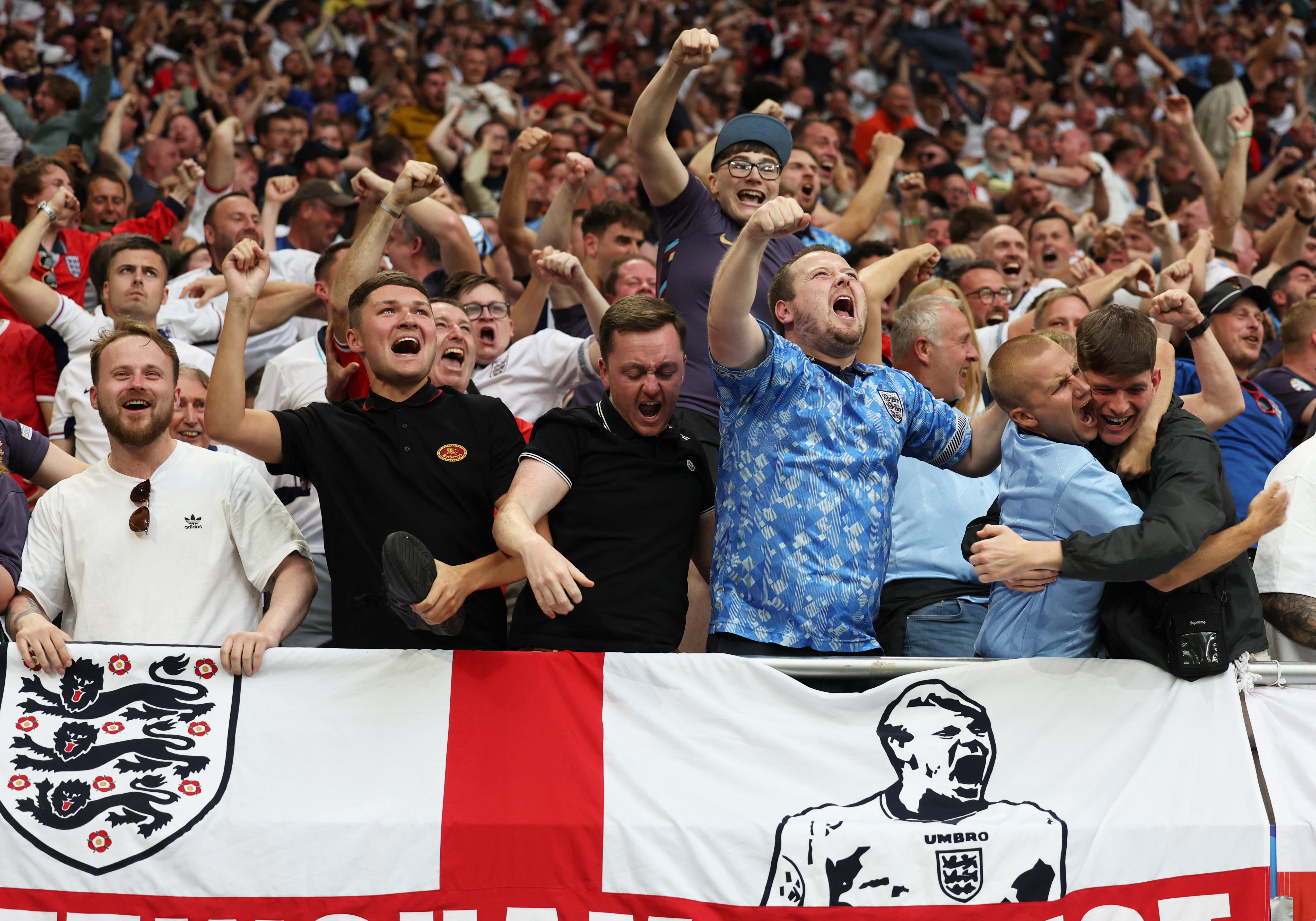 England fans seen celebrating after Jude Bellingham scores their first goal - but one footy fan was more happy about the win than others