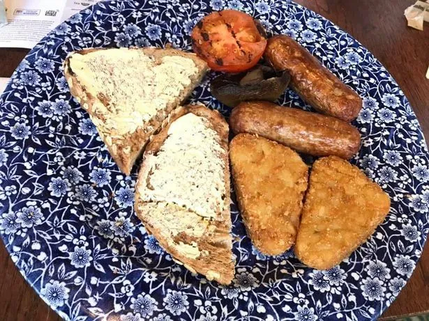 Spoons usually serves its food on blue plates