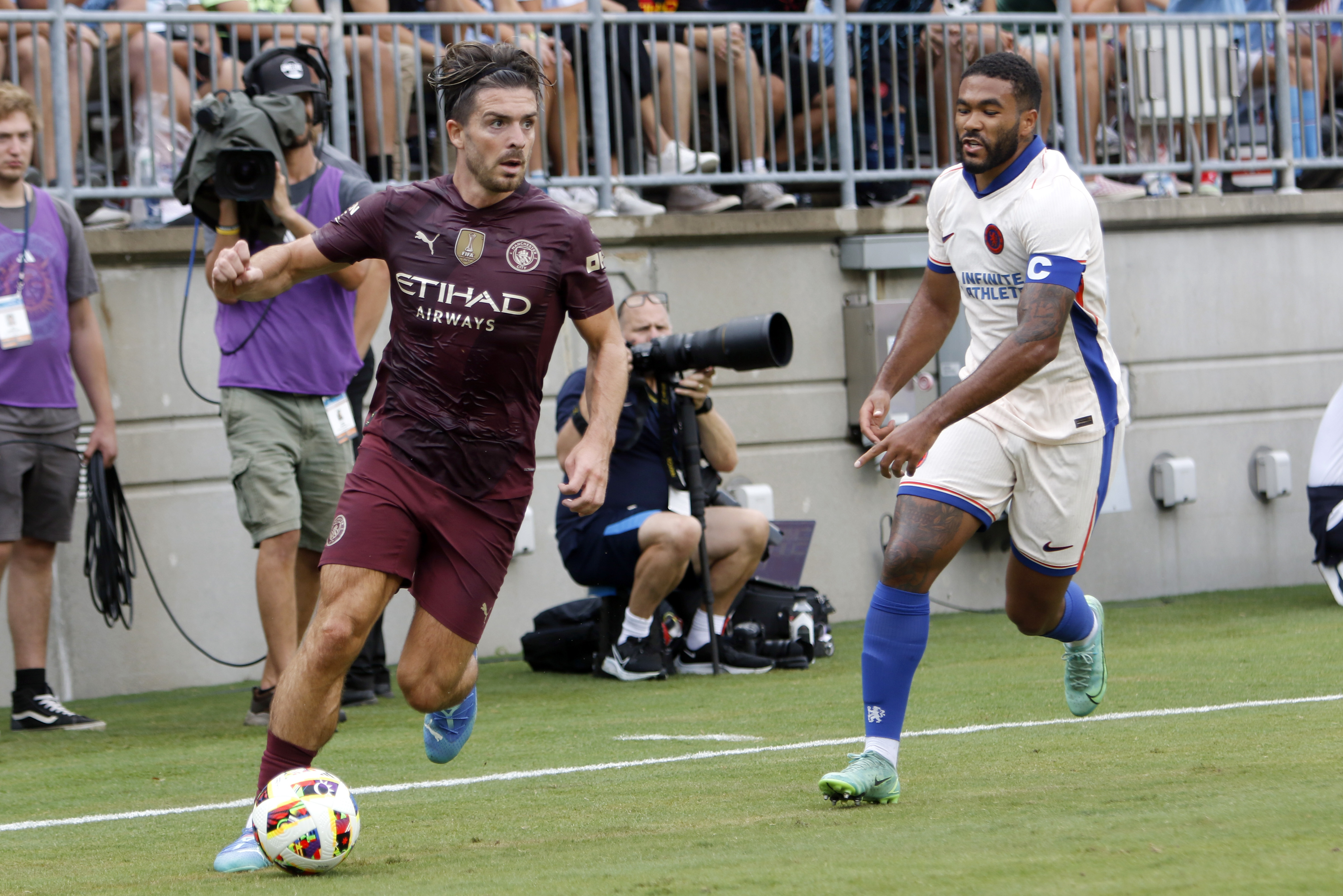 Reece James battles with Jack Grealish