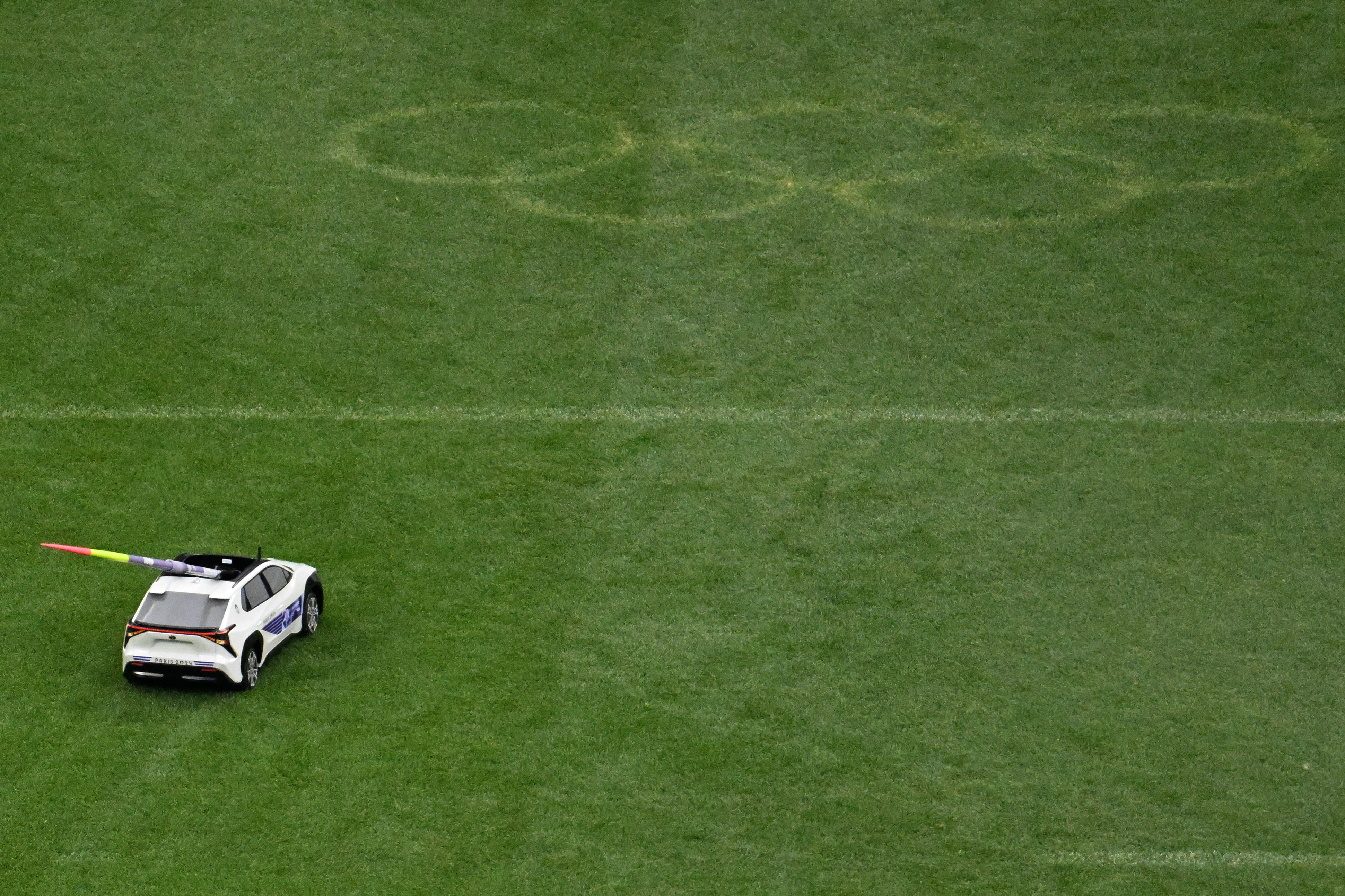 Viewers of the event and those in attendance at the Stade de France were stunned to see the javelins being returned by remote-controlled cards