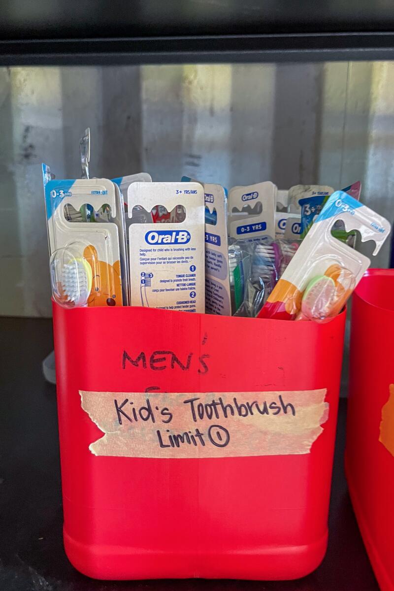 A bucket of kids' toothbrushes 