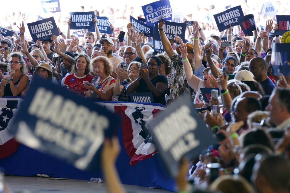 Several Harris supporters tried to drown out the noise of the protesters