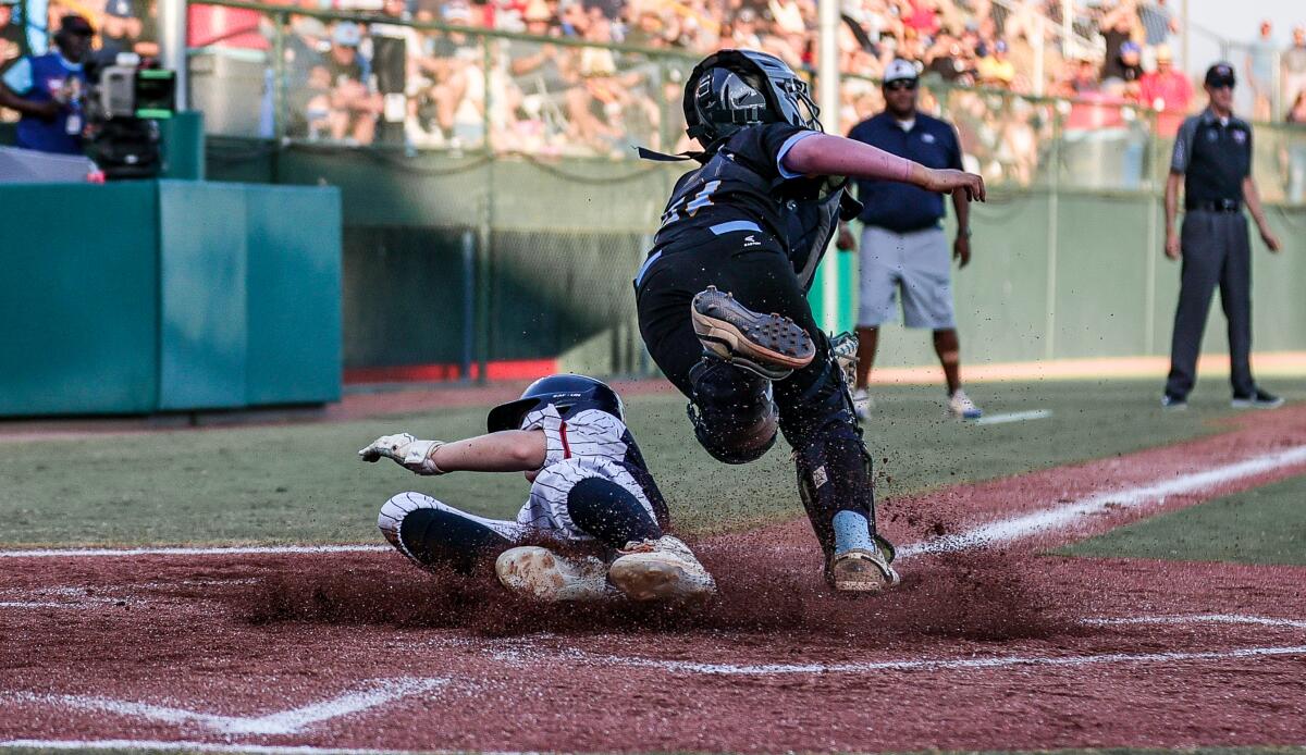 Jack Mette of Eastvale scores his team's only run on Friday night.