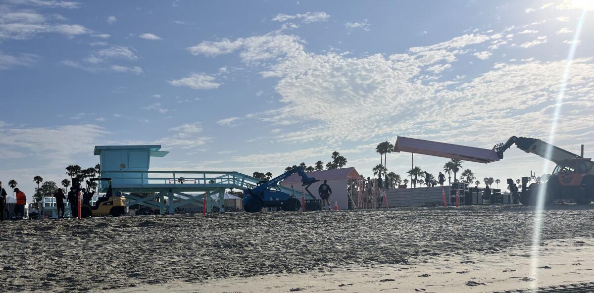 Filming activity is seen from a distance at Rosie's dog beach, which was transformed for Olympics purposes.