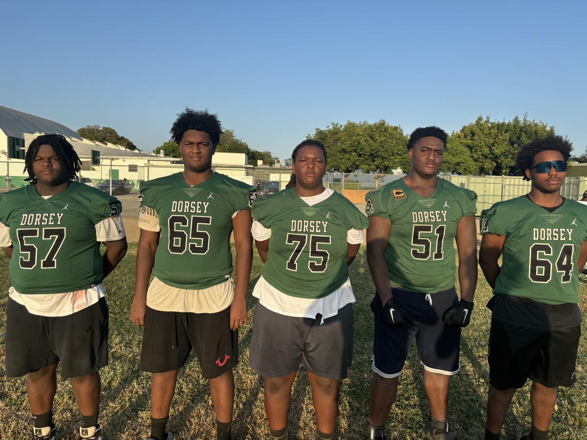 Dorsey's big offensive line: Chris Barnett (left), King Jackson, Derrick Armstrong, Mike McDonald, Alonzo Holmes.