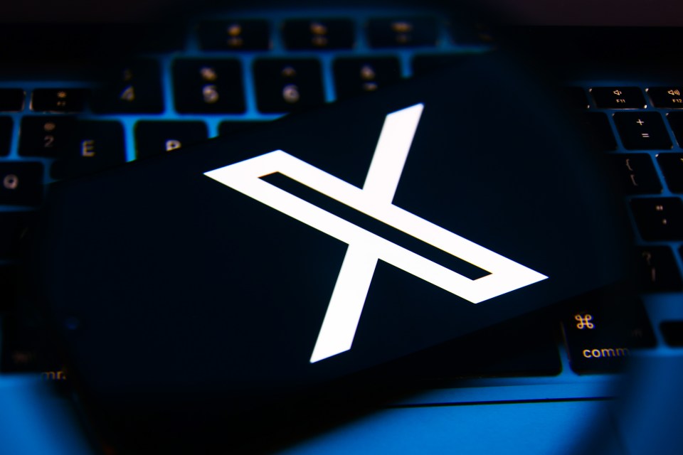 X, former Twitter, logo is screened on a mobile phone for illustration photo