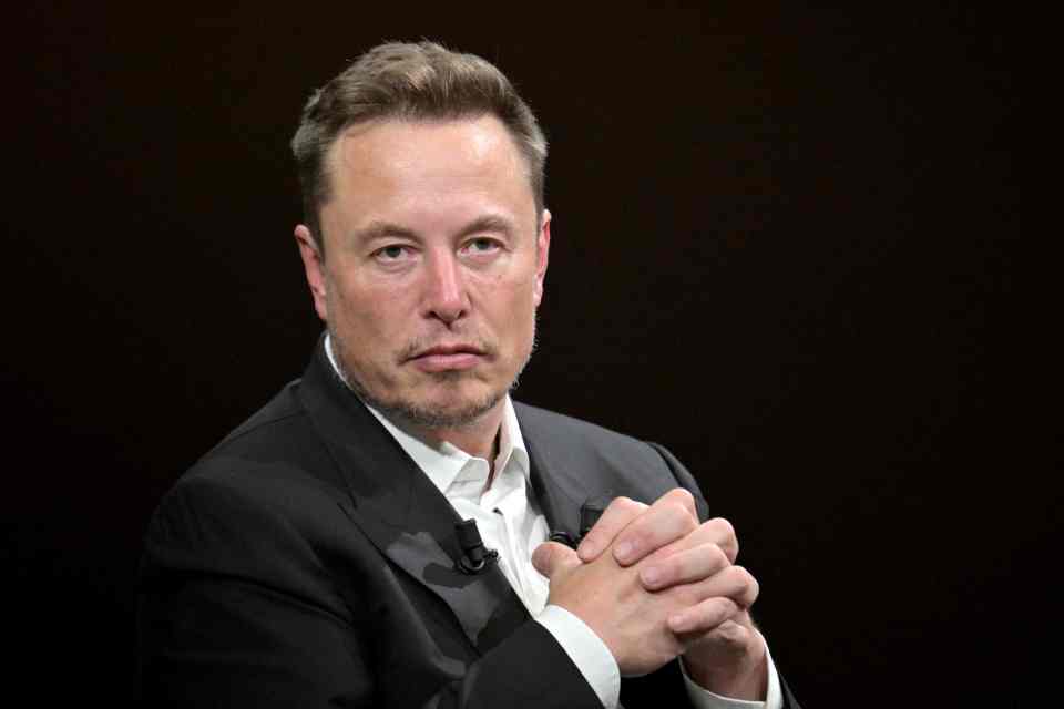 Tesla CEO Elon Musk looks on as he speaks during his visit at the Vivatech technology startups and innovation fair at the Porte de Versailles exhibition center in Paris, on June 16, 2023