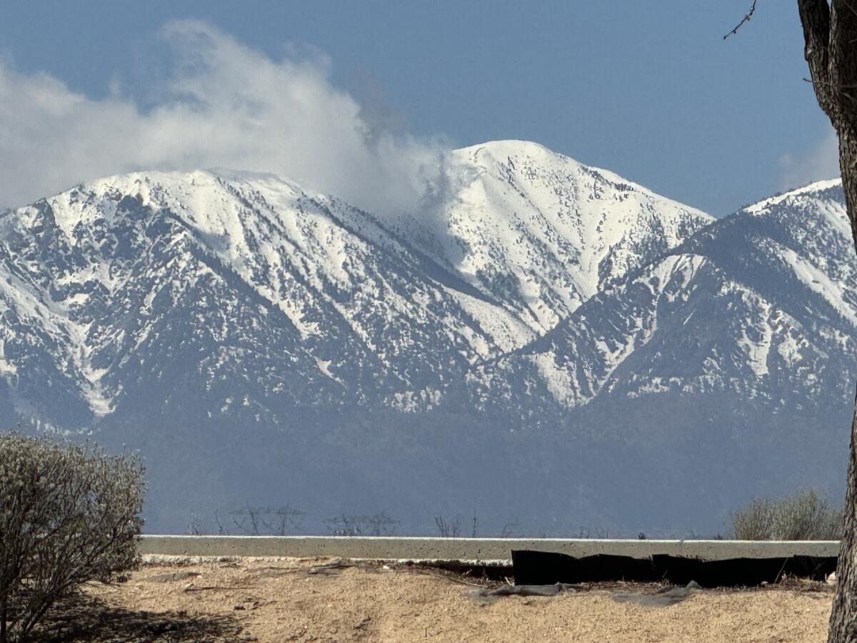 Snow-covered mountains visible last spring from Oak Hills High.